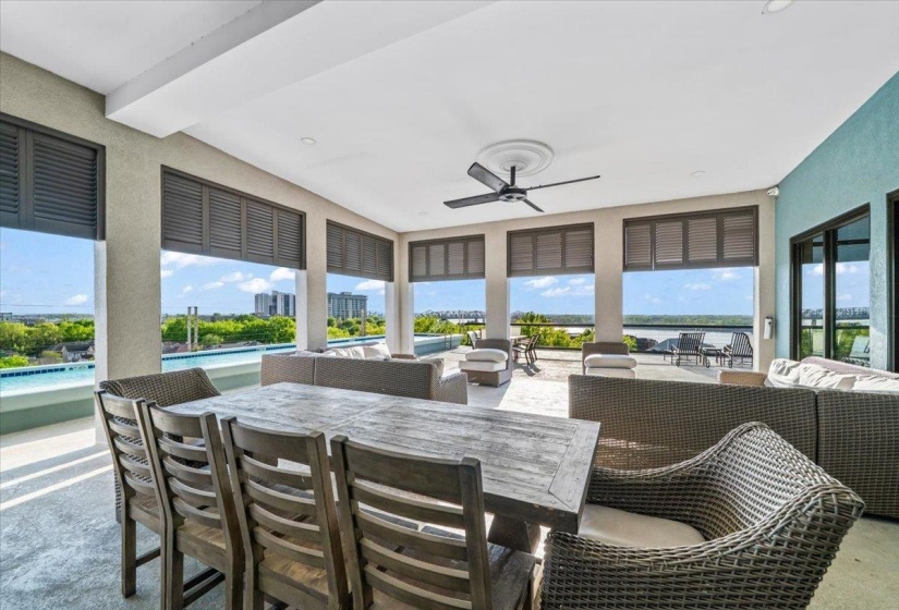 View of patio featuring a ceiling fan, an outdoor pool, and outdoor lounge area