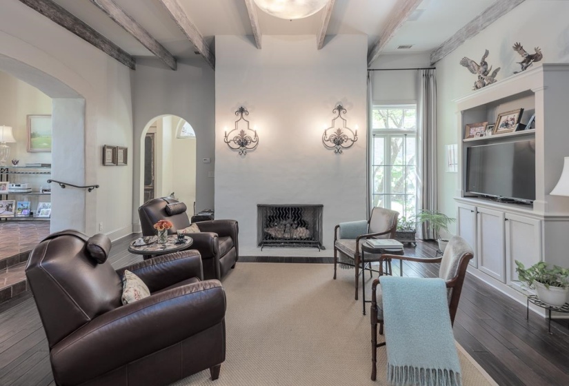 Cozy Den with Fireplace directly off of kitchen