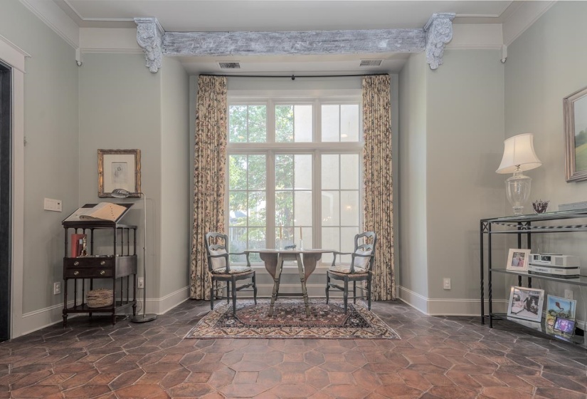 With beautiful view of the backyard and access to the covered porch.