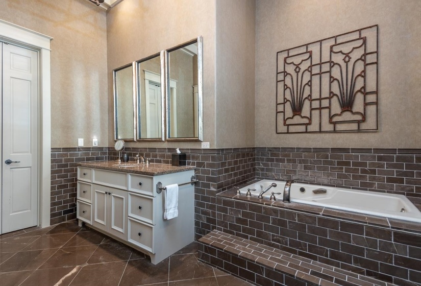 Marble, separate tub and shower.