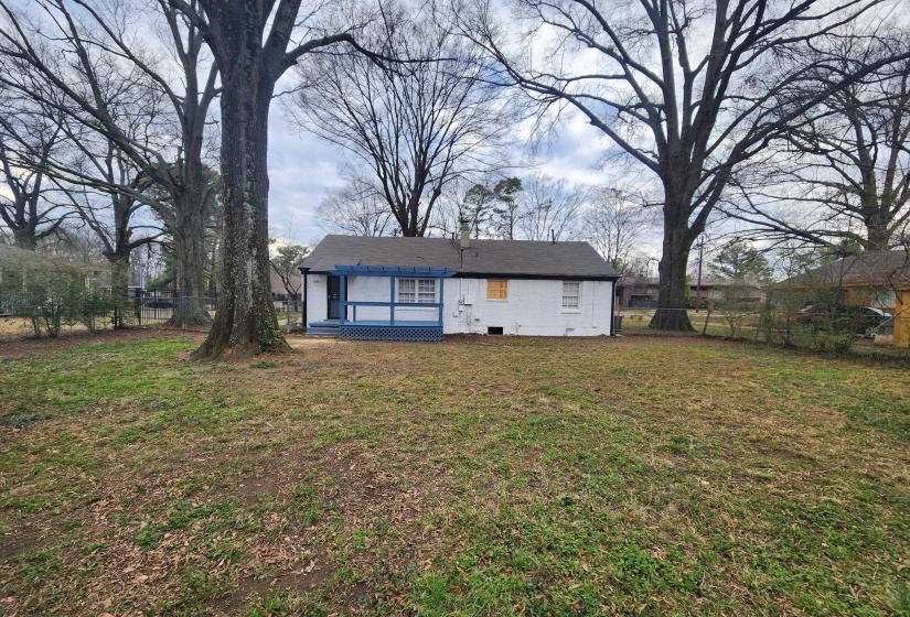 Back of property featuring a deck