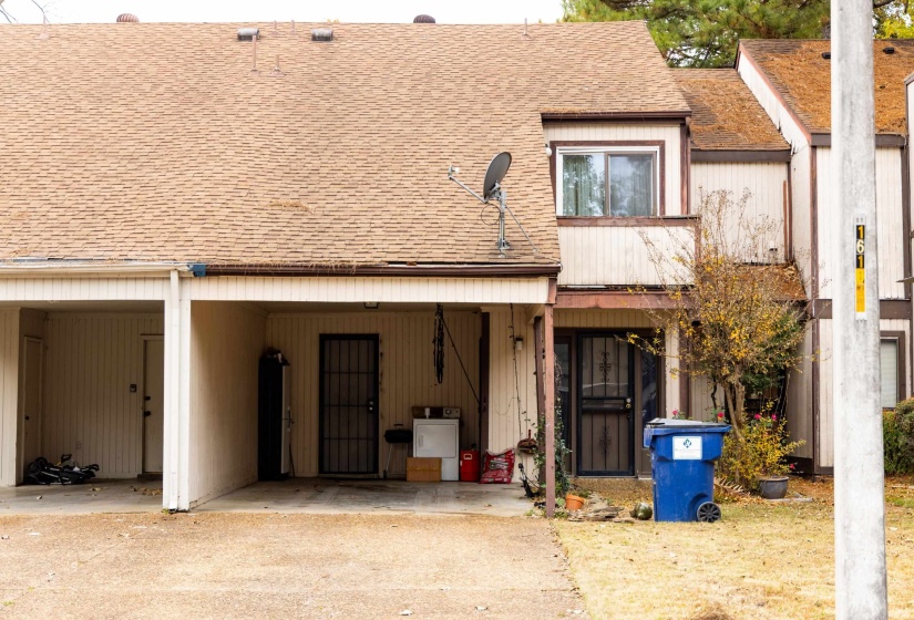 View of front of property with roof with shingles