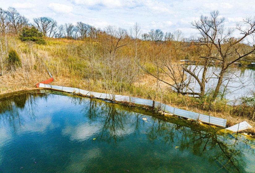 Water view with a boat dock
