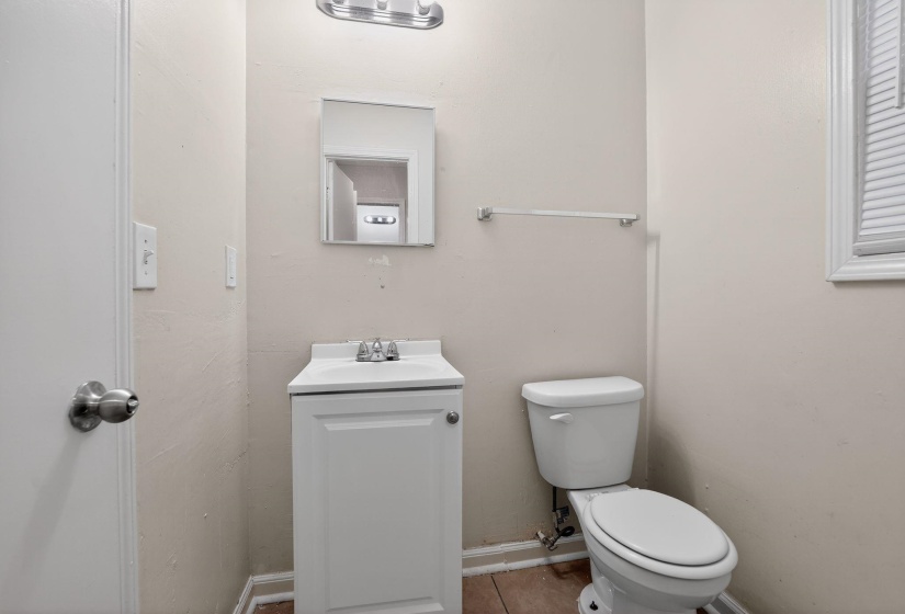 Bathroom featuring vanity and tile patterned flooring