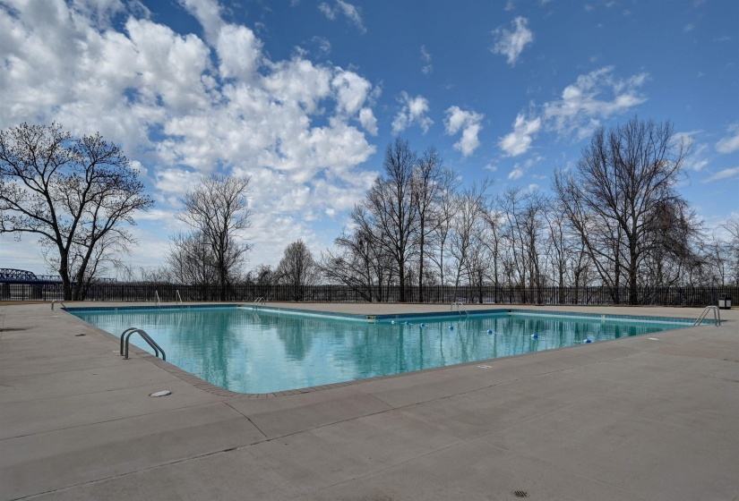 Community pool featuring a patio