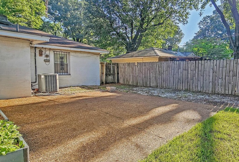 Double Wrought Iron Doors Leads to Patio