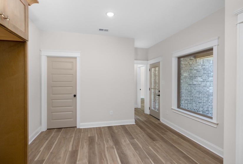 Unfurnished bedroom with a closet, light wood-type flooring, and recessed lighting