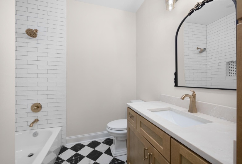 Bathroom with vanity and  shower combination