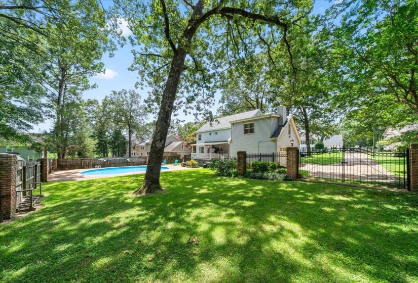 View of fenced backyard