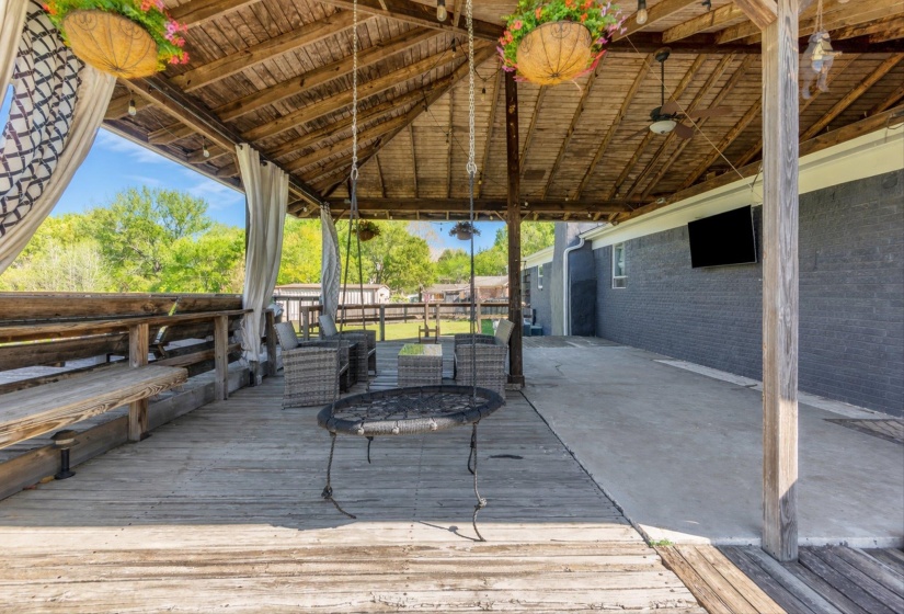 Wooden deck with a patio area