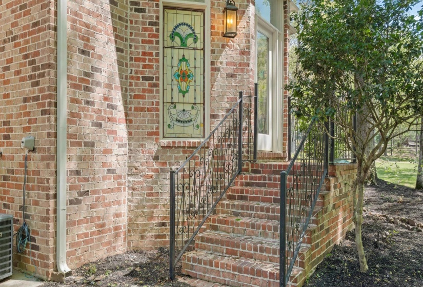 Property entrance with brick siding