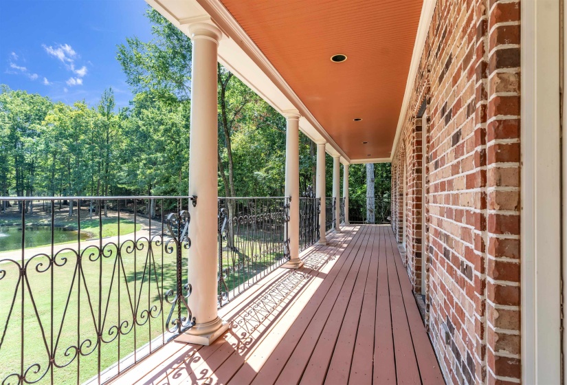 Wooden deck with view of scattered trees