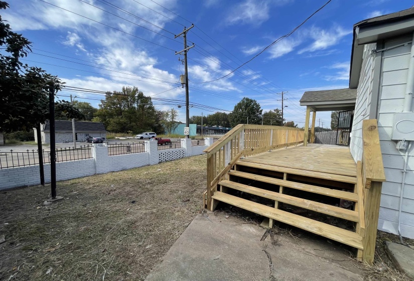 View of yard featuring a deck
