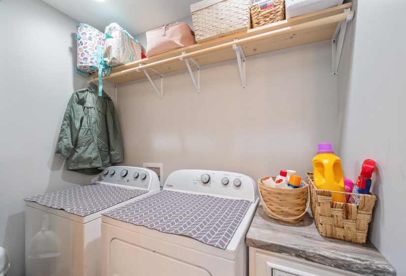 Laundry area featuring independent washer and dryer