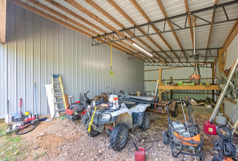 Garage featuring metal wall