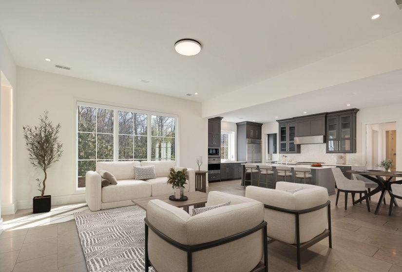 Living room featuring recessed lighting and baseboards