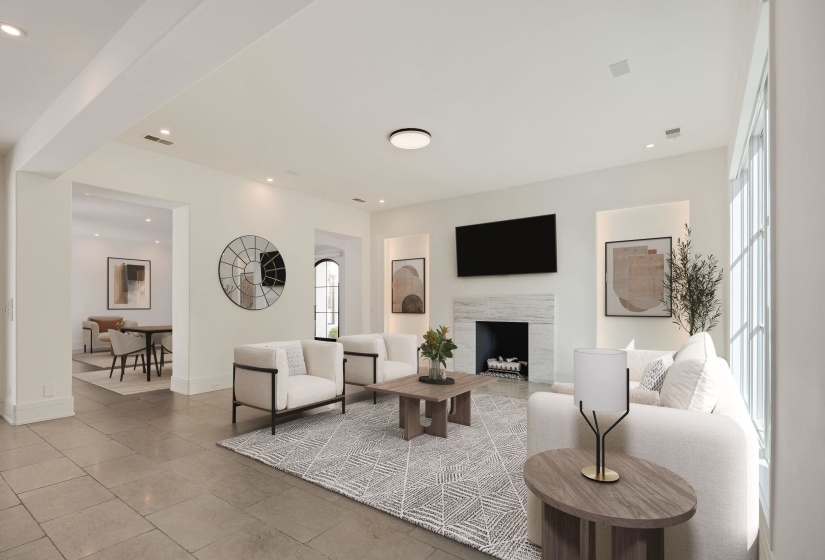 Living area featuring recessed lighting and a high end fireplace