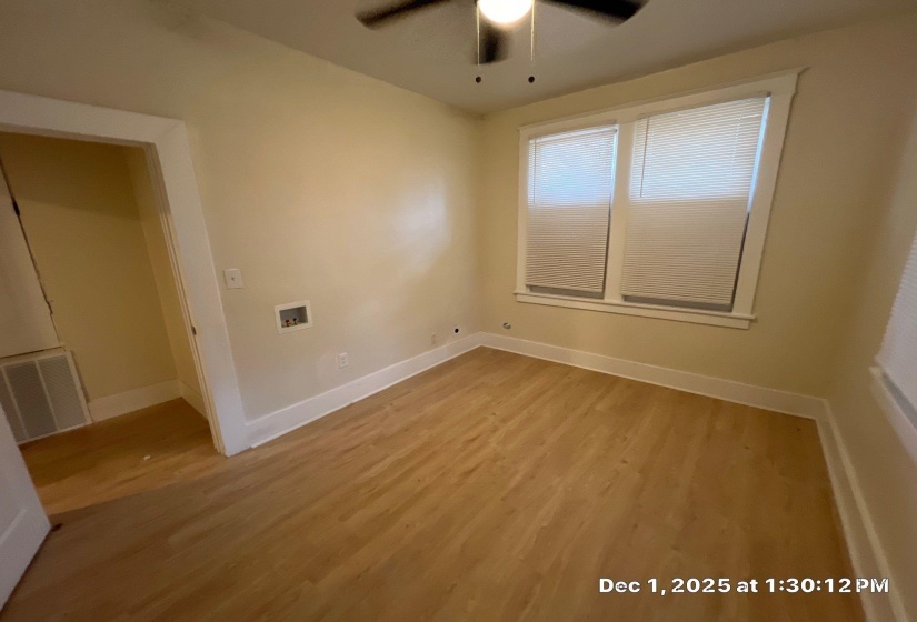 Unfurnished room with light wood-style floors and ceiling fan