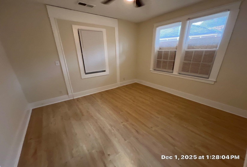 Empty room featuring light wood-style flooring and baseboards