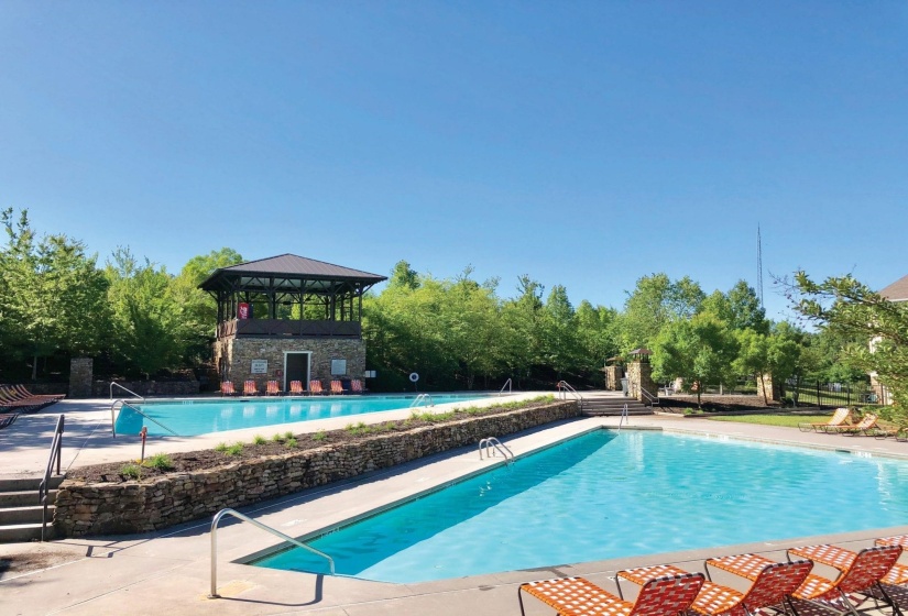 Community pool with a patio and a gazebo