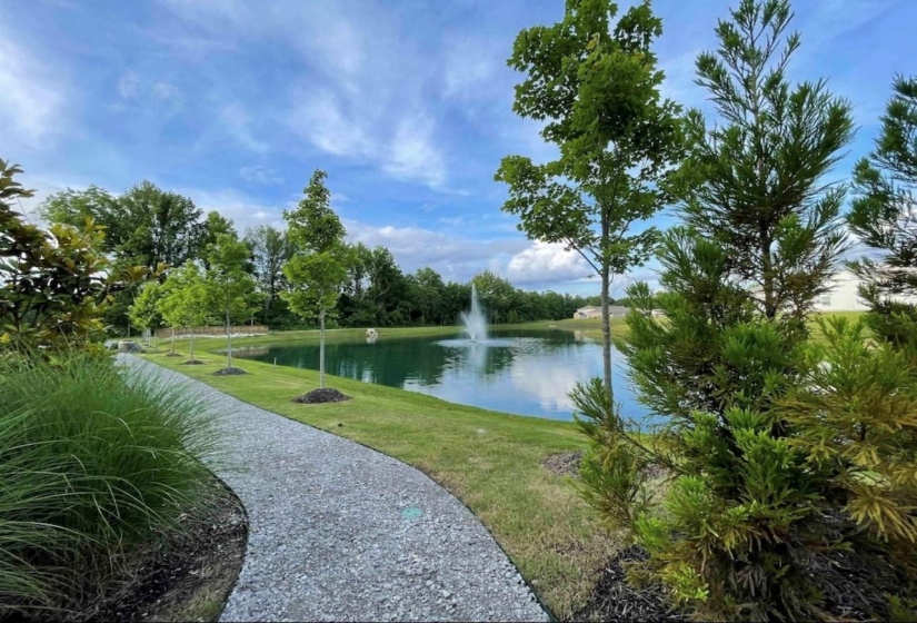 View of property's community with a water view