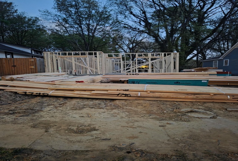 View of swimming pool with a wooden deck