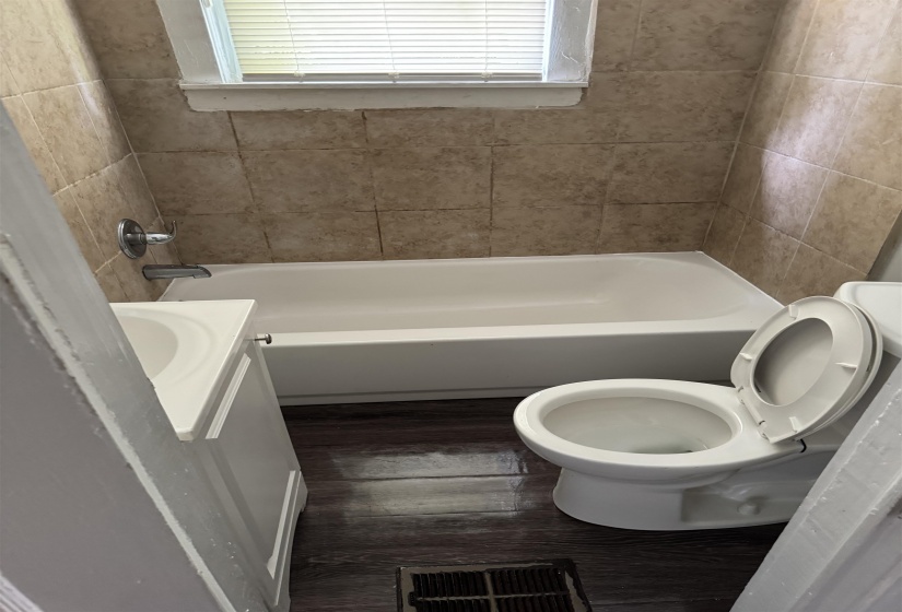Bathroom with vanity and dark wood finished floors