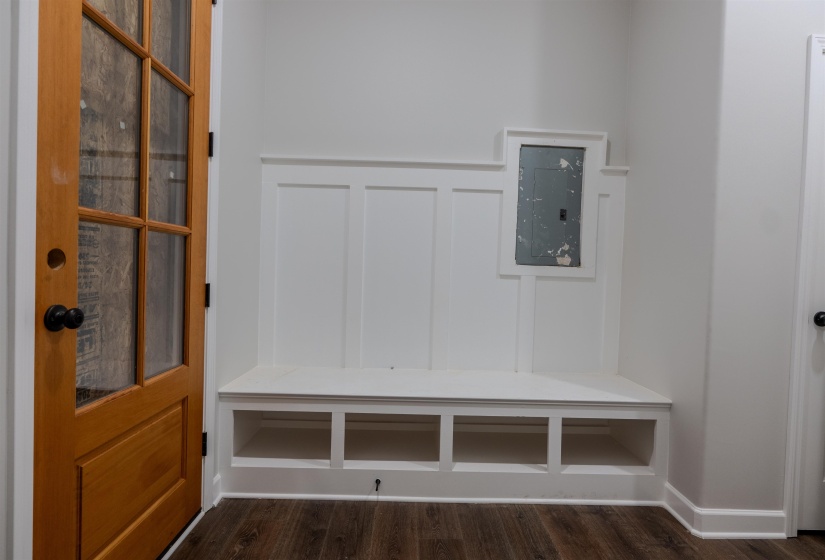 Mudroom with dark hardwood / wood-style flooring