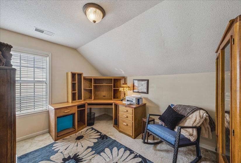 Office featuring baseboards and light carpet