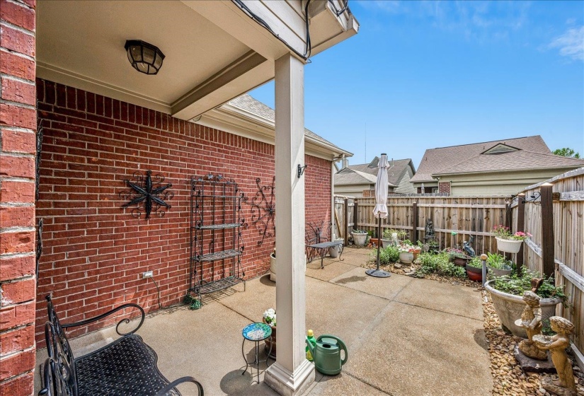 Fenced backyard featuring a patio area