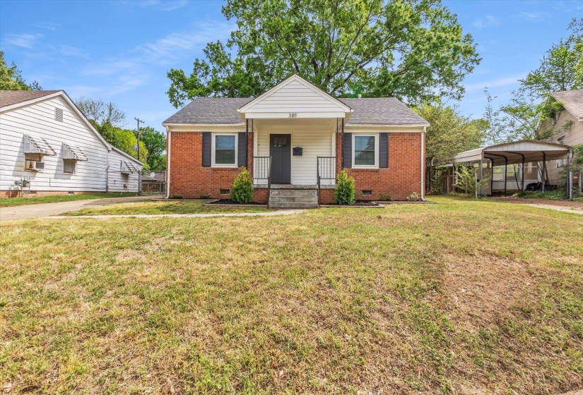 Bungalow-style house featuring crawl space, covered porch, a front yard, and brick siding