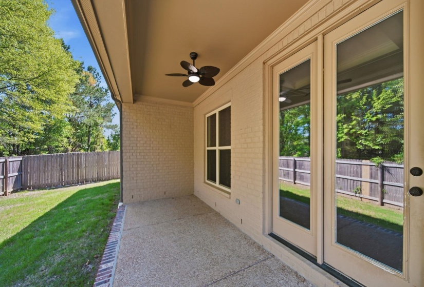 View of patio with a ceiling fan