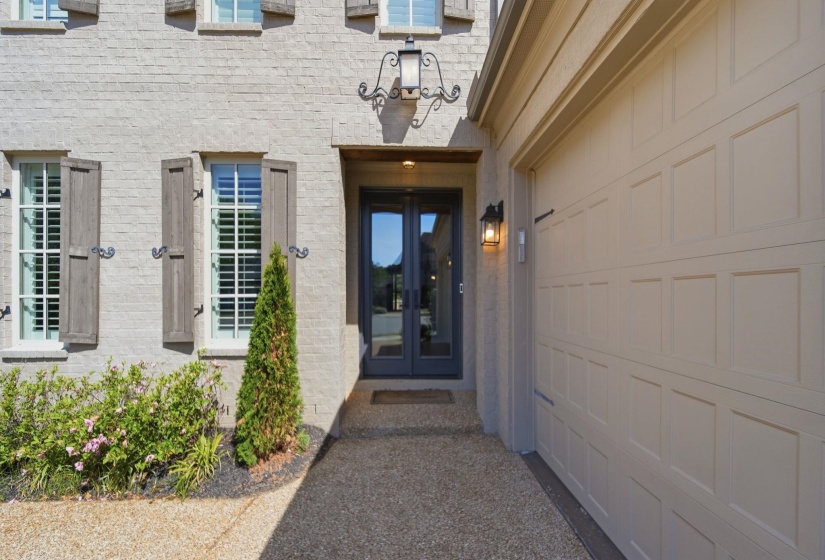 Property entrance featuring french doors