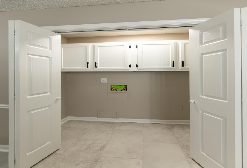 Laundry room with cabinet space and washer hookup