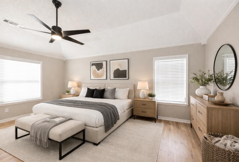 Bedroom with crown molding, ceiling fan, and light wood-style floors