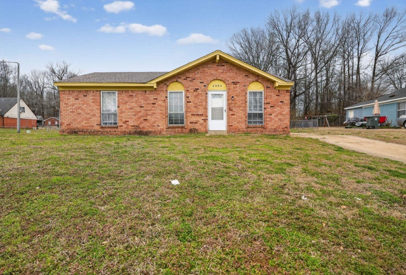 View of front of house featuring brick siding