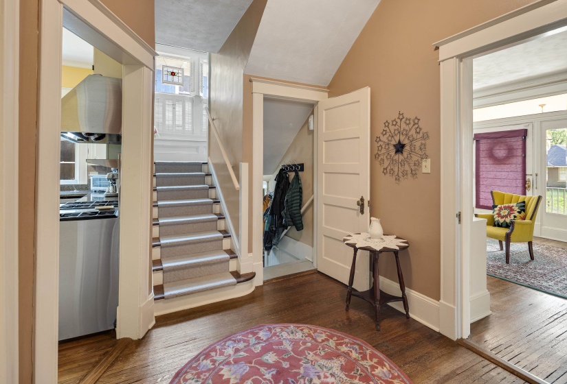 Foyer featuring dark wood-style floors and healthy amount of natural light