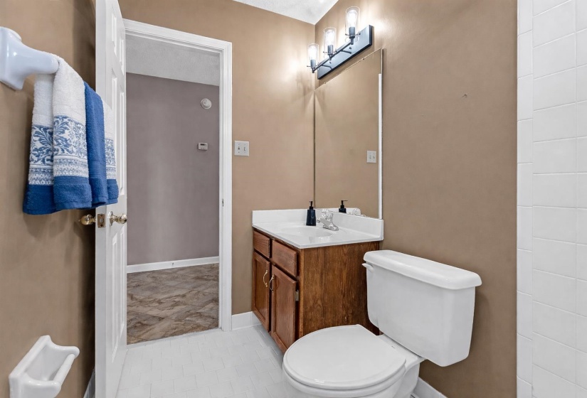 Bathroom with vanity and light tile patterned floors