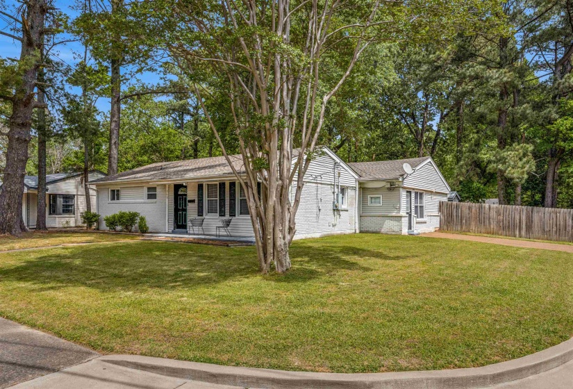 Ranch-style home featuring covered porch
