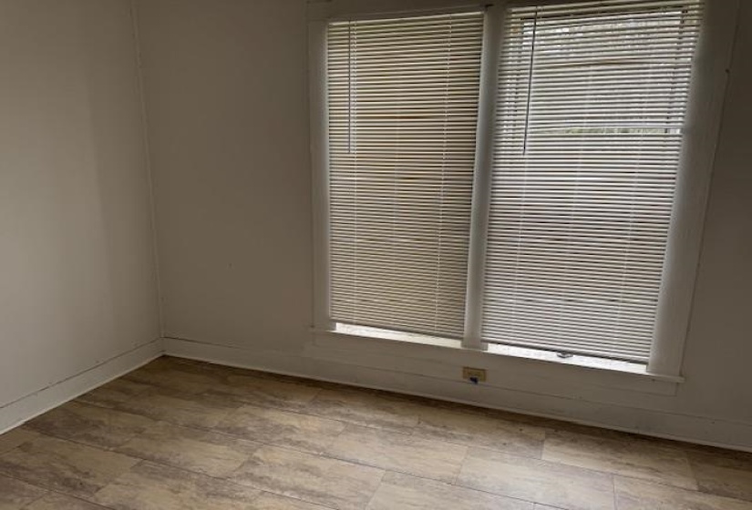 Unfurnished room featuring baseboards