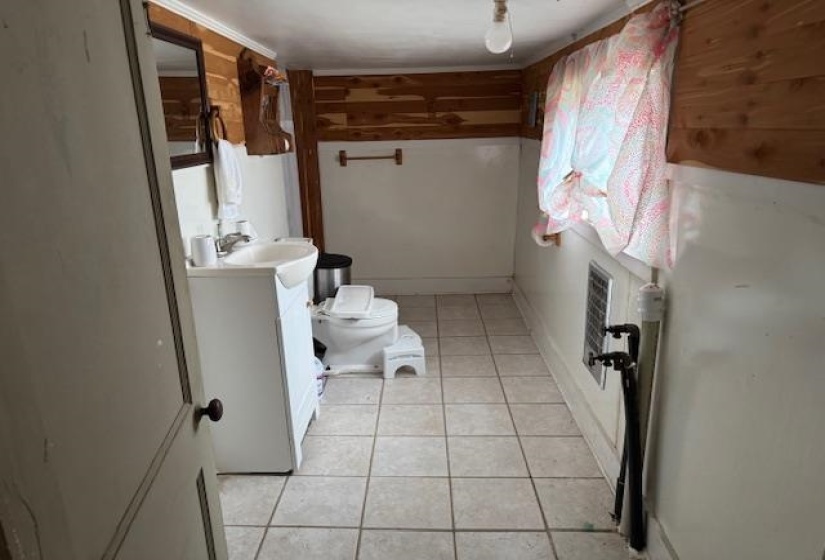 Bathroom featuring vanity and light tile patterned flooring