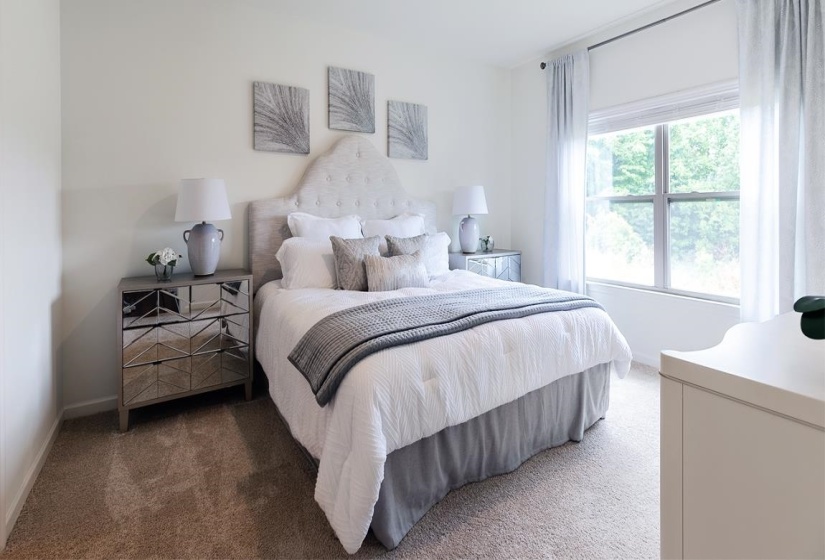 Bedroom with carpet
