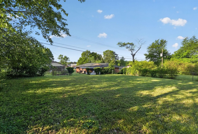 View of fenced backyard