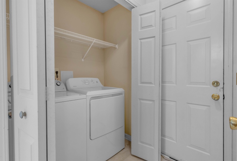 Laundry area featuring separate washer and dryer