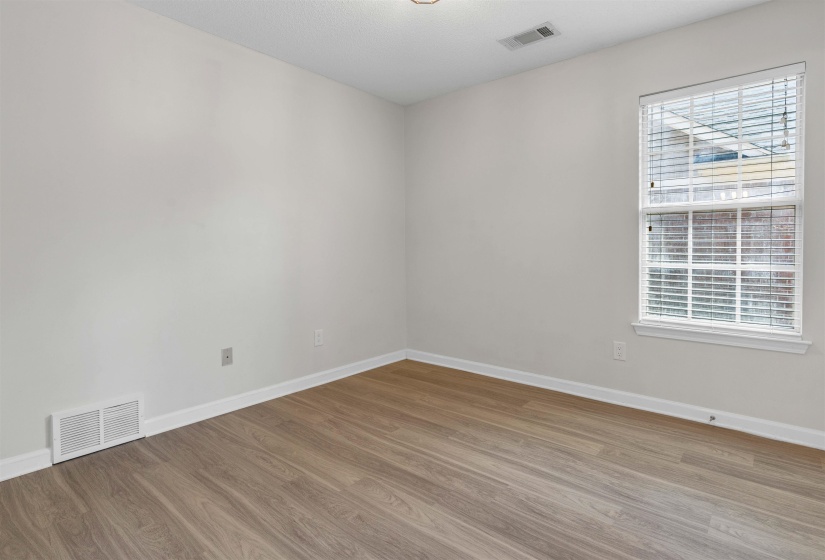 Spare room with wood finished floors
