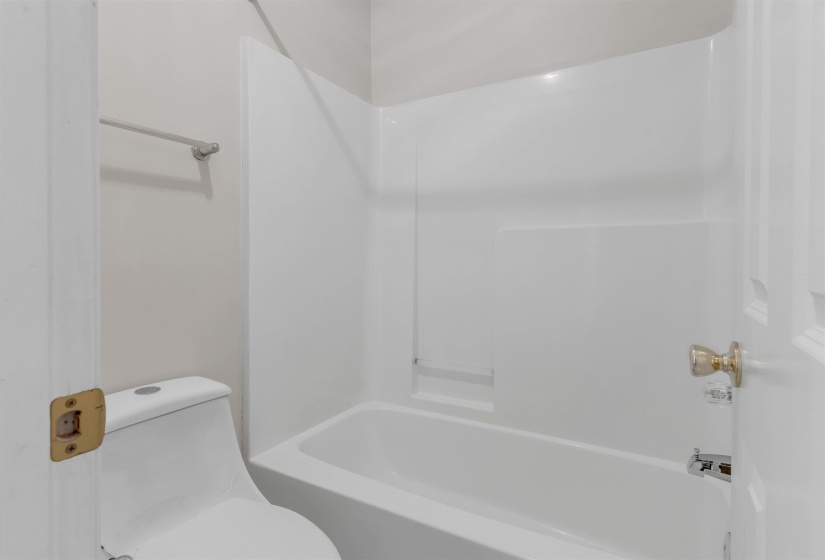 Full bath with toilet and  shower combination