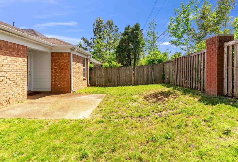 Fenced backyard featuring a patio area