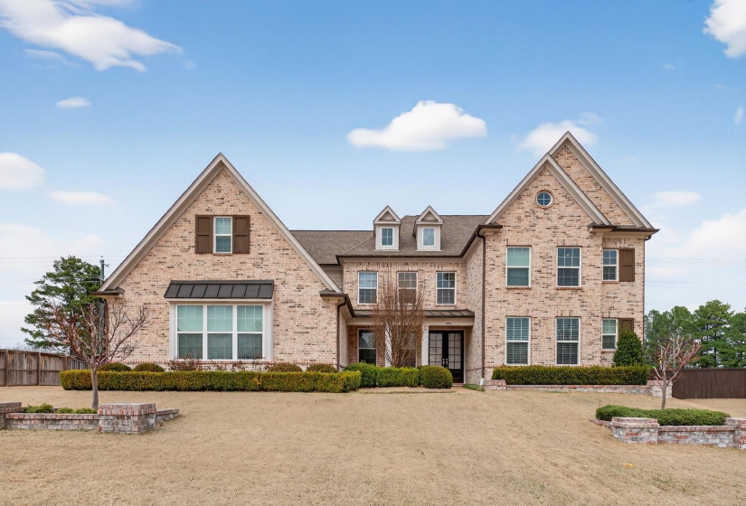 View of front of house featuring brick siding