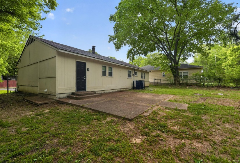 Rear view of property with entry steps and a patio area