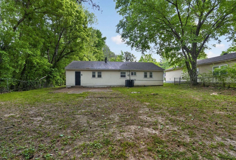 Rear view of house featuring a patio